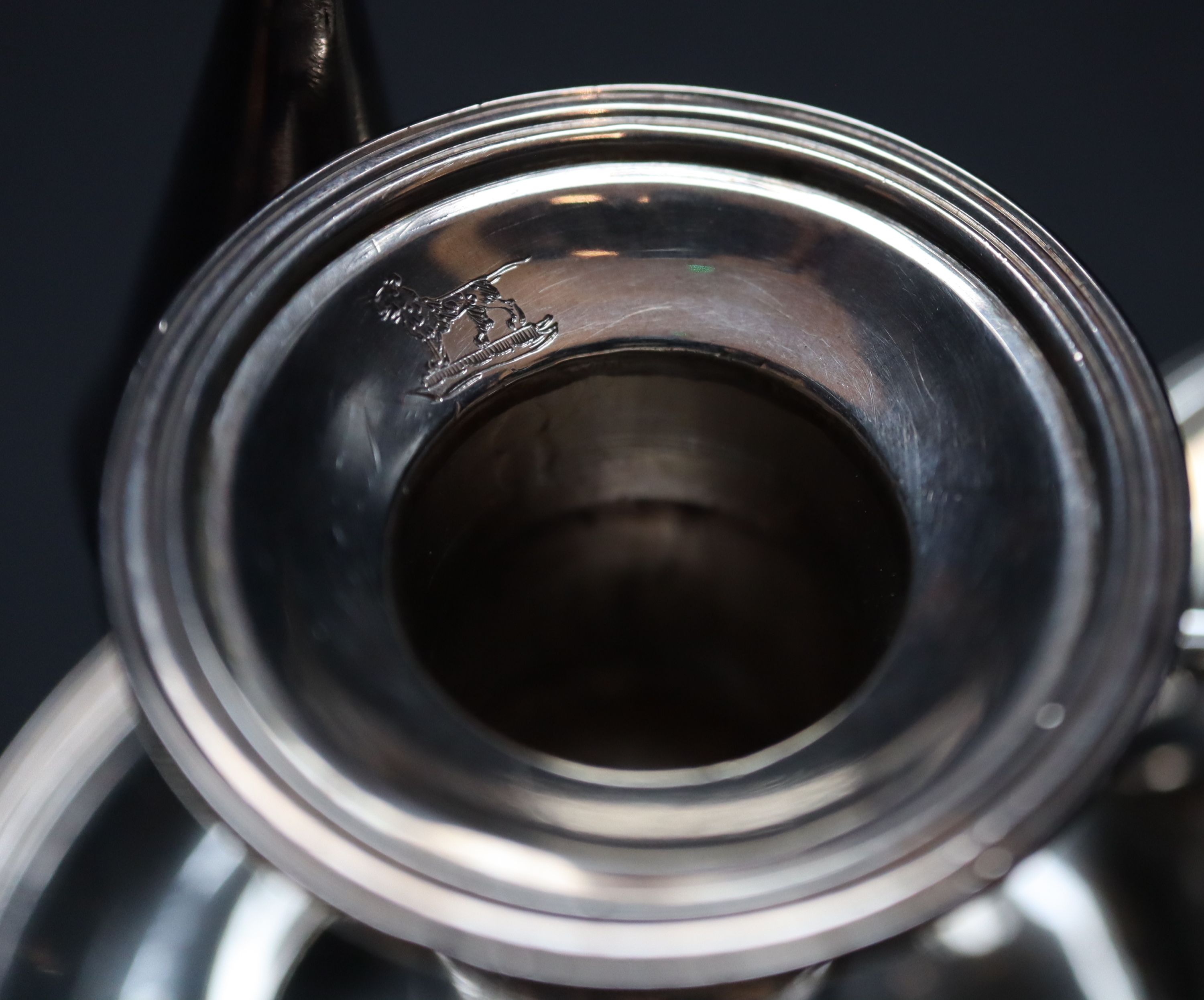 A George III silver miniature chamberstick, height 7.2cm, 96 grams.